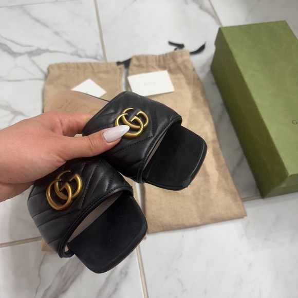 Gucci Shoes - Gucci Black Slides with Gold Emblem